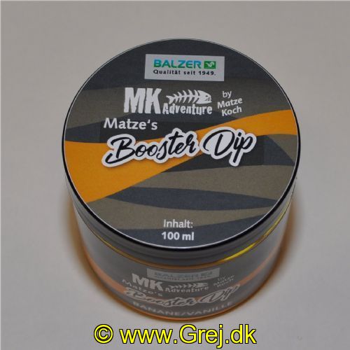 4005652820965 - MK Booster Dip, 100ml - Farve:Orange - Smag/duft:Banana/Vanilla - 001 8595 003<br>If you want to lift the hook bait especially to guide the carp even faster on the hook, dip it into Matze‘s booster liquid dips. The matching dips are equally suitable for the pop ups as well as for the basic boilies. They are matched in smell and colour exactly to the appropriate Boilies. Long-lasting fragrance.